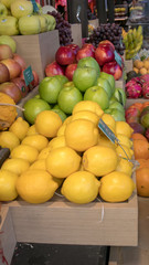 Fruit market with various colorful fresh fruits and vegetables