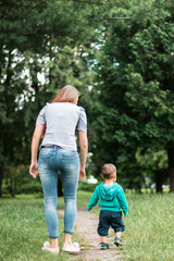 Fototapeta premium Mother play with son in the park.