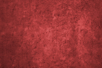Red wall with concrete texture as a background