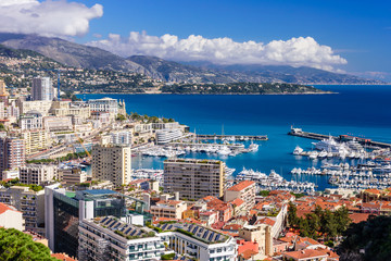 Fototapeta na wymiar Cityscape and harbor of Monte Carlo. Aerial view of Monaco on a Sunny day, Monte Carlo, Principality of Monaco