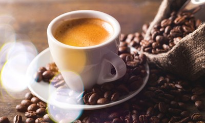 Cup of Coffee and Coffee Beans