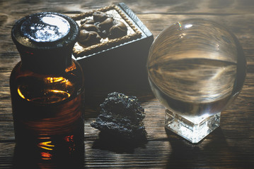 Crystal ball on the magic table background. Future reading.