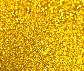 Textured golden background with brilliance