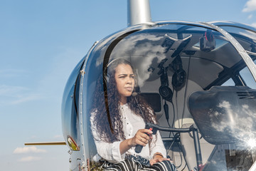 Young sexy woman helicopter pilot © Nexa