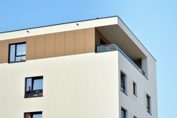 European modern residential architecture. Fragment of a modern apartment building in front. Very modern apartment house. 