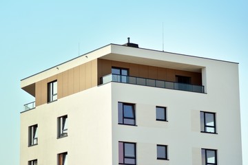 European modern residential architecture. Fragment of a modern apartment building in front. Very modern apartment house. 