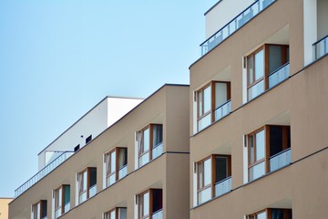 European modern residential architecture. Fragment of a modern apartment building in front. Very modern apartment house. 