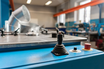 Control panel, buttons and joystick. the production of ventilation and gutters. Tool and bending equipment for sheet metal. manufacture or a demonstration stand in the store