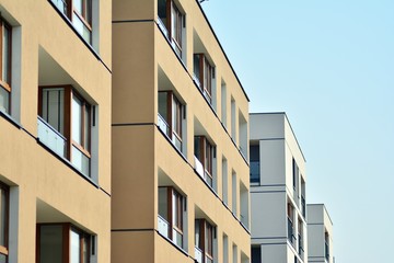 European modern residential architecture. Fragment of a modern apartment building in front. Very modern apartment house. 