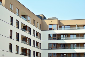 European modern residential architecture. Fragment of a modern apartment building in front. Very modern apartment house. 