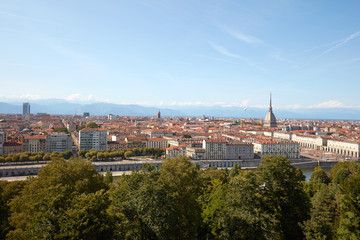 Fototapeta na wymiar Turin skyline panorama view and Mole Antonelliana tower in a sunny summer day in Italy