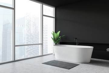 Fototapeta na wymiar Modern design bathroom interior with bathtube and panoramic window.