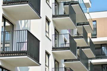 Fototapeta premium European modern residential architecture. Fragment of a modern apartment building in front. Very modern apartment house. 