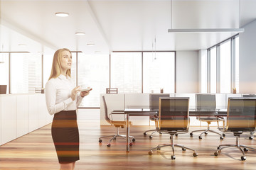 Blonde woman in office meeting room
