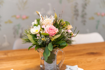 bouquet of flowers on wooden table