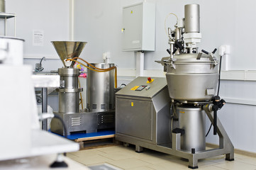 Industrial equipment for the production of food, mixer of liquids in stainless steel. Big shaker