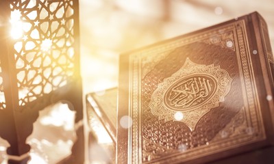 Islamic Book Koran with rosary on grey - obrazy, fototapety, plakaty