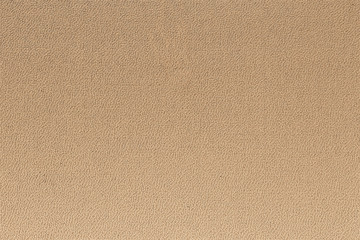 Fototapeta na wymiar Sand colored artificial leather texture background