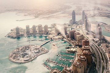 Doha, the capital of the state of Qatar. View from the airplane - obrazy, fototapety, plakaty