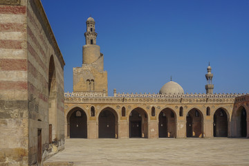 Fototapeta na wymiar Cairo, Egypt: The minaret of the Mosque of Ibn Tulun (879 AD) -- the oldest in Cairo surviving in its original form and the largest in land area.