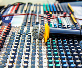 Microphone on mixing console close-up