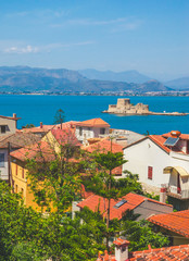 Panoramic view on beautiful city Nafplio and Bourtzi castle, Greece