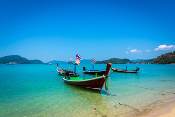 Fototapeta na wymiar Long tail boats on the tropical beach, Andaman Sea, Thailand