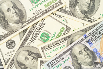 One hundred dollars bills background. High resolution photo of money macro.