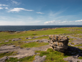 Atlantic ocean, West coast of Ireland. Burren region, Sunny day, Rock and stone plateau.