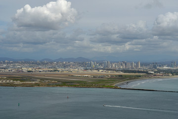 View of San Diego downtown from Cabrillo National Monument. Point Loma San Diego Bay during cloudy day.