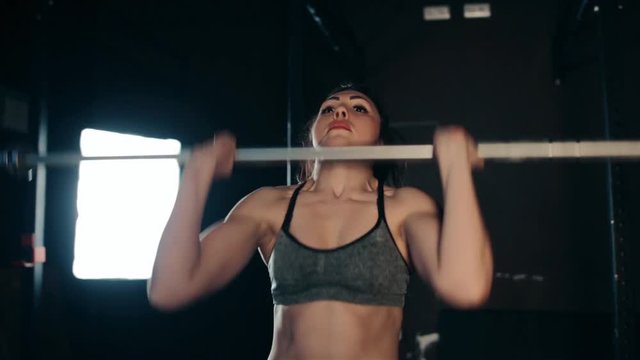 girl trains in a crossfit room