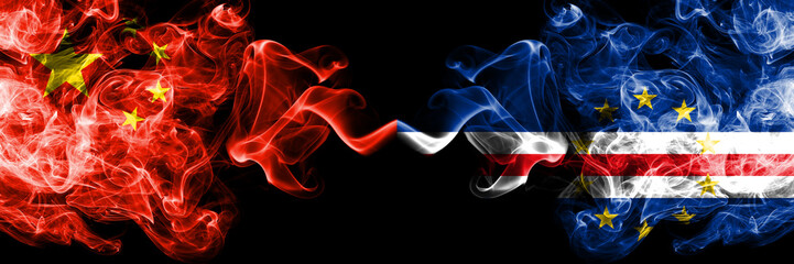 China vs Cape Verde smoke flags placed side by side. Thick colored silky smoke flags of Chinese and Cape Verde