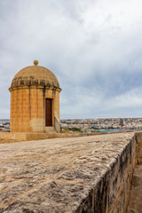 Fototapeta na wymiar Hastings Gardens watch tower over the city of Valletta, Malta