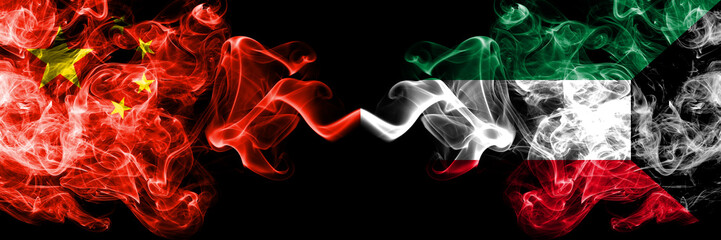 China vs Kuwait, Kuwaiti smoke flags placed side by side. Thick colored silky smoke flags of Chinese and Kuwait, Kuwaiti