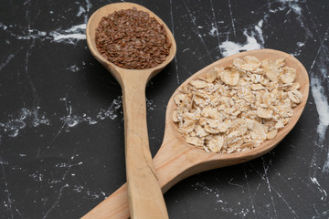 Seeds on a wooden spoon close up