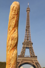 Fototapeta na wymiar Baguette aligned with Eiffel Tower in Paris 