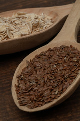 Seeds on a wooden spoon close up