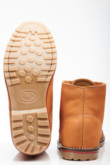 Back and sole of brown tall shoes