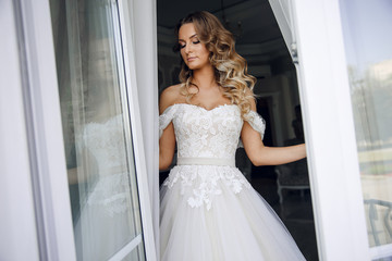 Bride's morning at the hotel.The bride before the wedding preparation.Beautiful bride