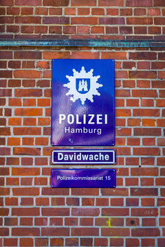 Hamburg, Germany - June 25, 2014: Street Plate on the Davidwache building, the best known police station in Hamburg, located in the St. Pauli quarter near Reeperbahn. Hamburg Police Department 15