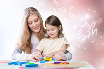 Happy Mother and daughter drawing