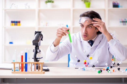 Young Male Scientist Working In The Lab 