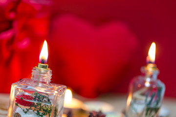 Beautiful candles and gifts burning on Valentine's Day