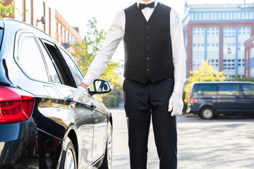 Valet's Hand Opening Car Door