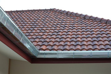 stainless steel of roof gutter on residential house