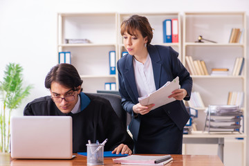 Two lawyers working in the office
