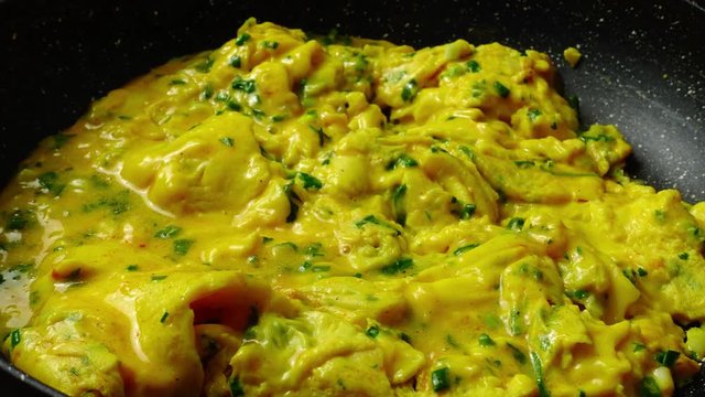 Preparation of omelet on a frying pan. Time lapse.