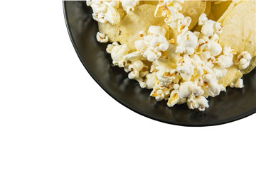 Popcorn and Potato chips in a plate on isolated background