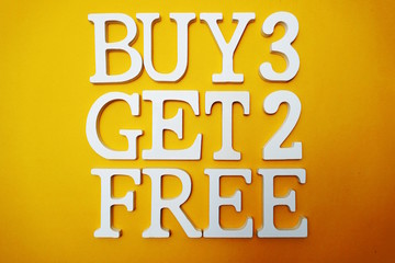 Buy three get two Free Sale Promotion on Yellow background