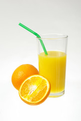 Orange juice. orange and glass with orange juice. On white